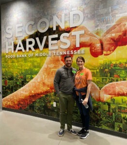Tommy Doerfler volunteering at Second Harvest with his wife